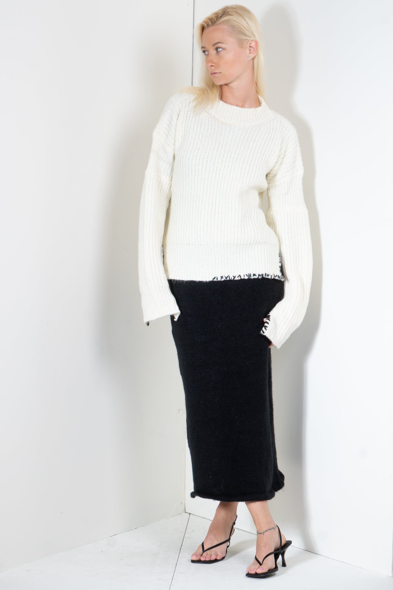 Ribbed Sweater with Embroidered Hem