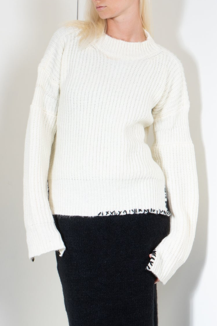 Ribbed Sweater with Embroidered Hem