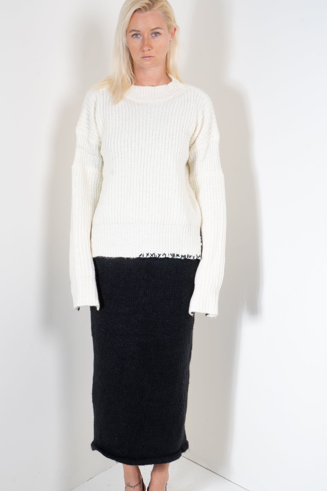 Ribbed Sweater with Embroidered Hem