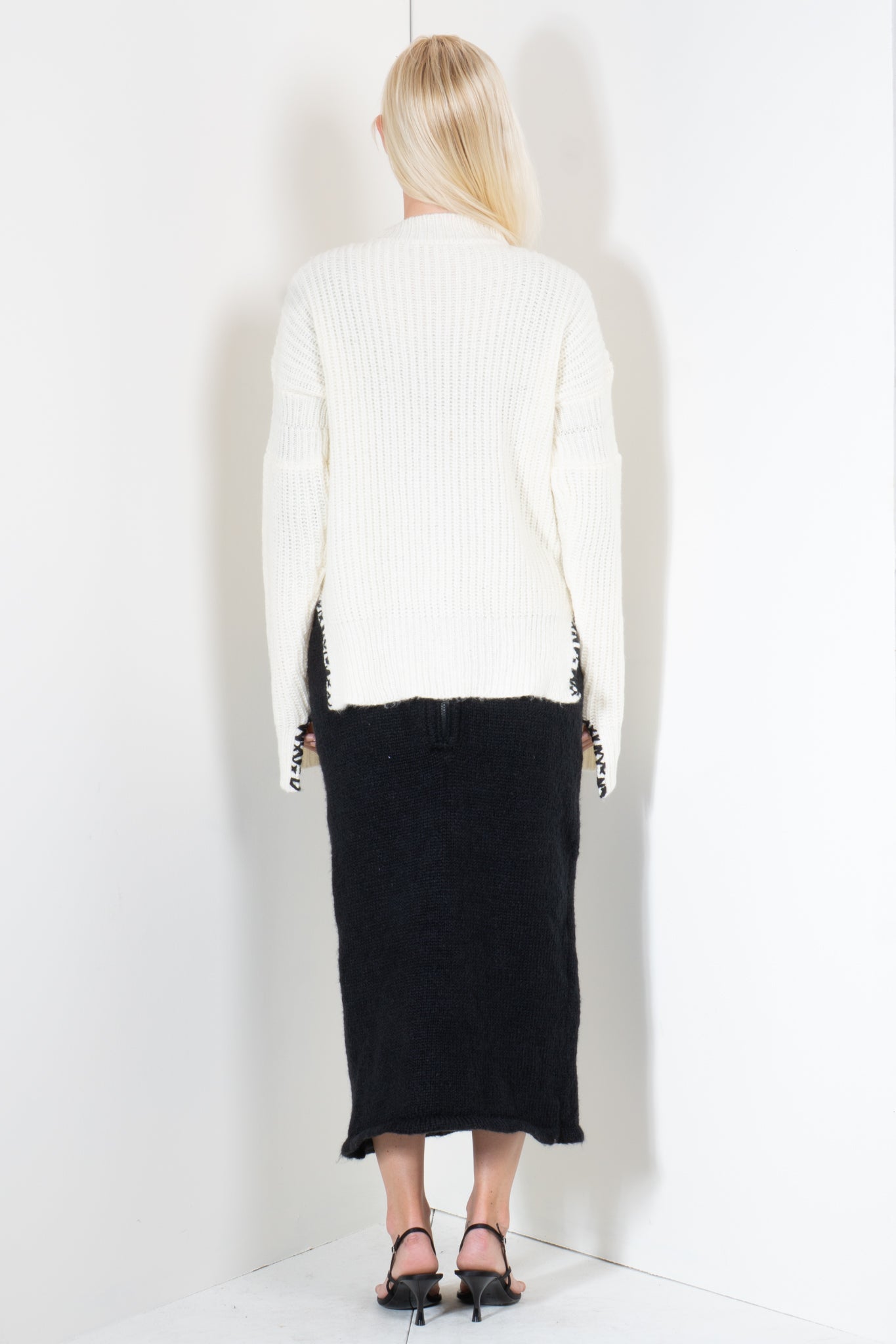 Ribbed Sweater with Embroidered Hem