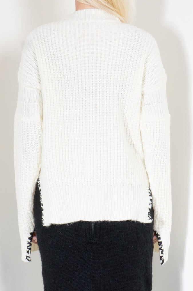 Ribbed Sweater with Embroidered Hem
